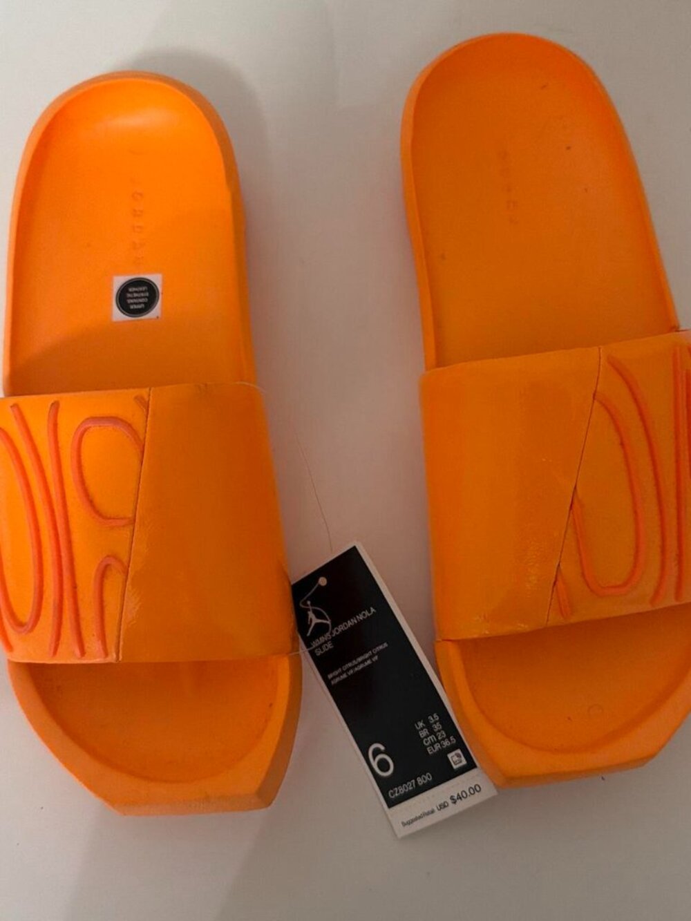 Jordan orange slides, women's US 6